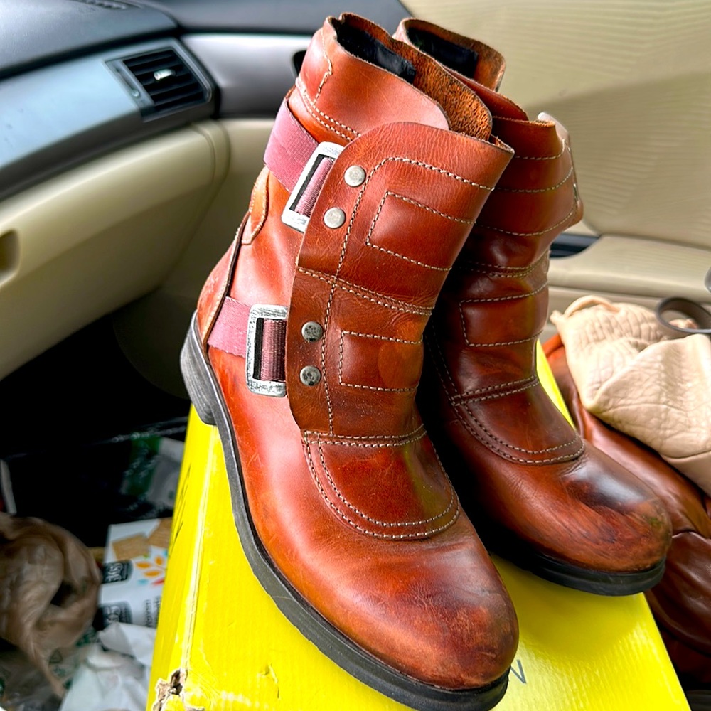 Beautiful Fly London Booties. Burnished Leather. Color is Rug Brick.